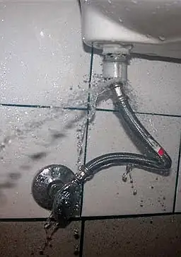 High water pressure pipe burst causing residential water damage in Grand Rapids MI home